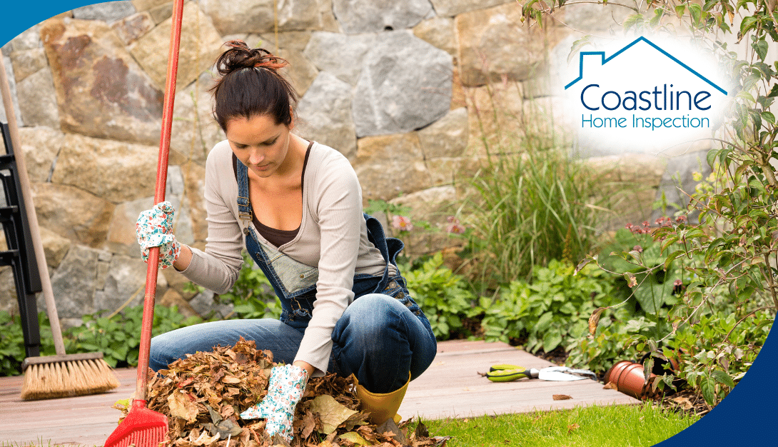 Woman raking leaves in a backyard, symbolizing seasonal home maintenance