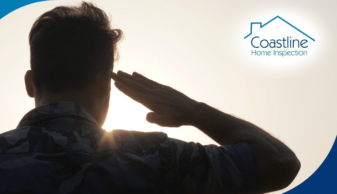 Silhouette of a veteran saluting at sunset