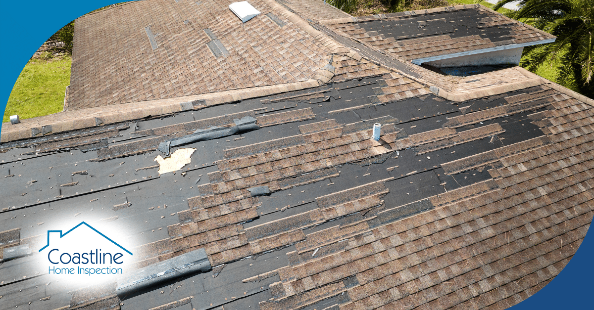 Damaged roof shingles with missing patches and exposed underlayment